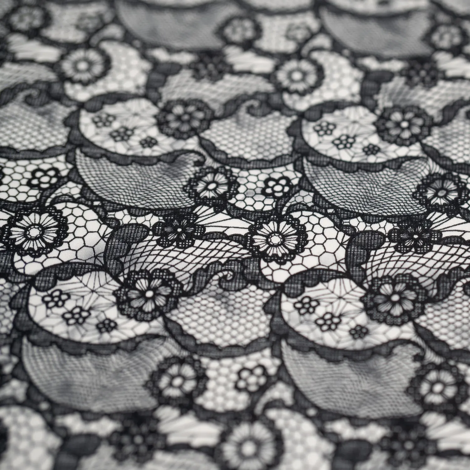 Black Paisley Lace Pattern on White Printed Spandex Fabric | Blue Moon Fabrics